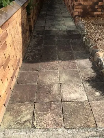 Before: tiled garden path, weathered and stained.