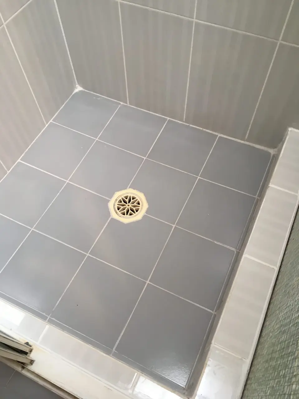 After: new grout and white sealant.