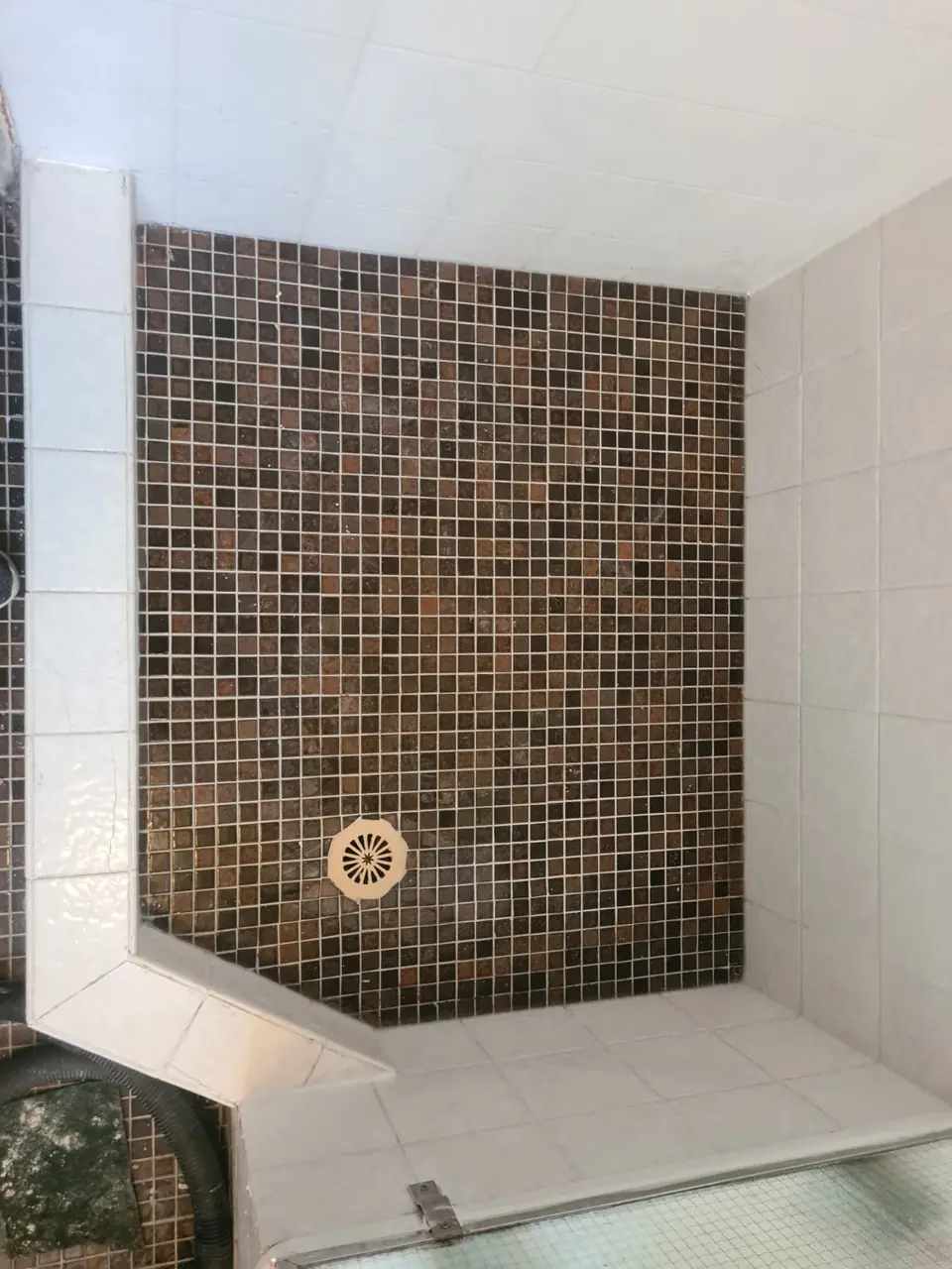 After: clean grout and resealed junctions.